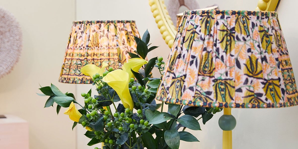 Floral lamp shades and flowers.